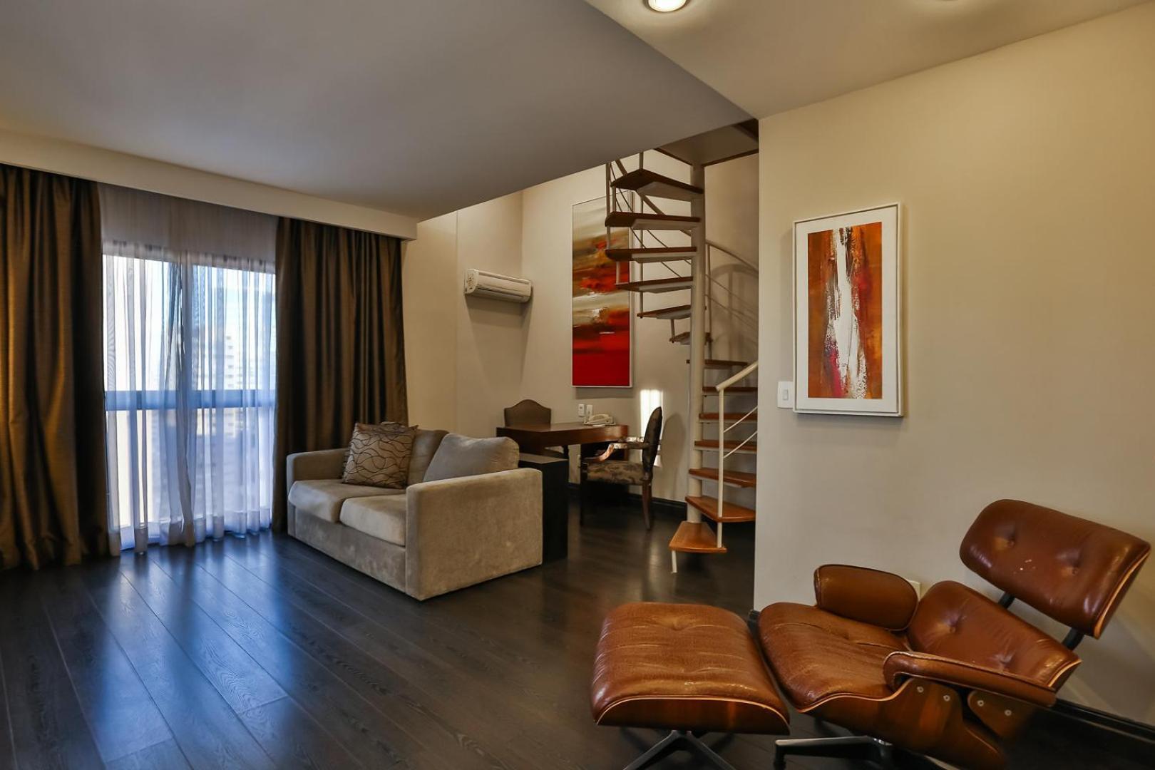 Hotel Double Tree By Hilton Sao Paulo Itaim Extérieur photo A living room with a spiral staircase